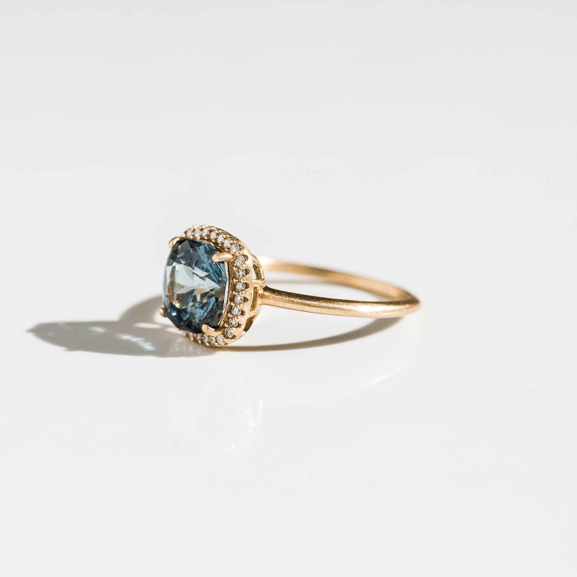 Blue Garnet Cushion Ring with Diamond Halo in 14k Gold