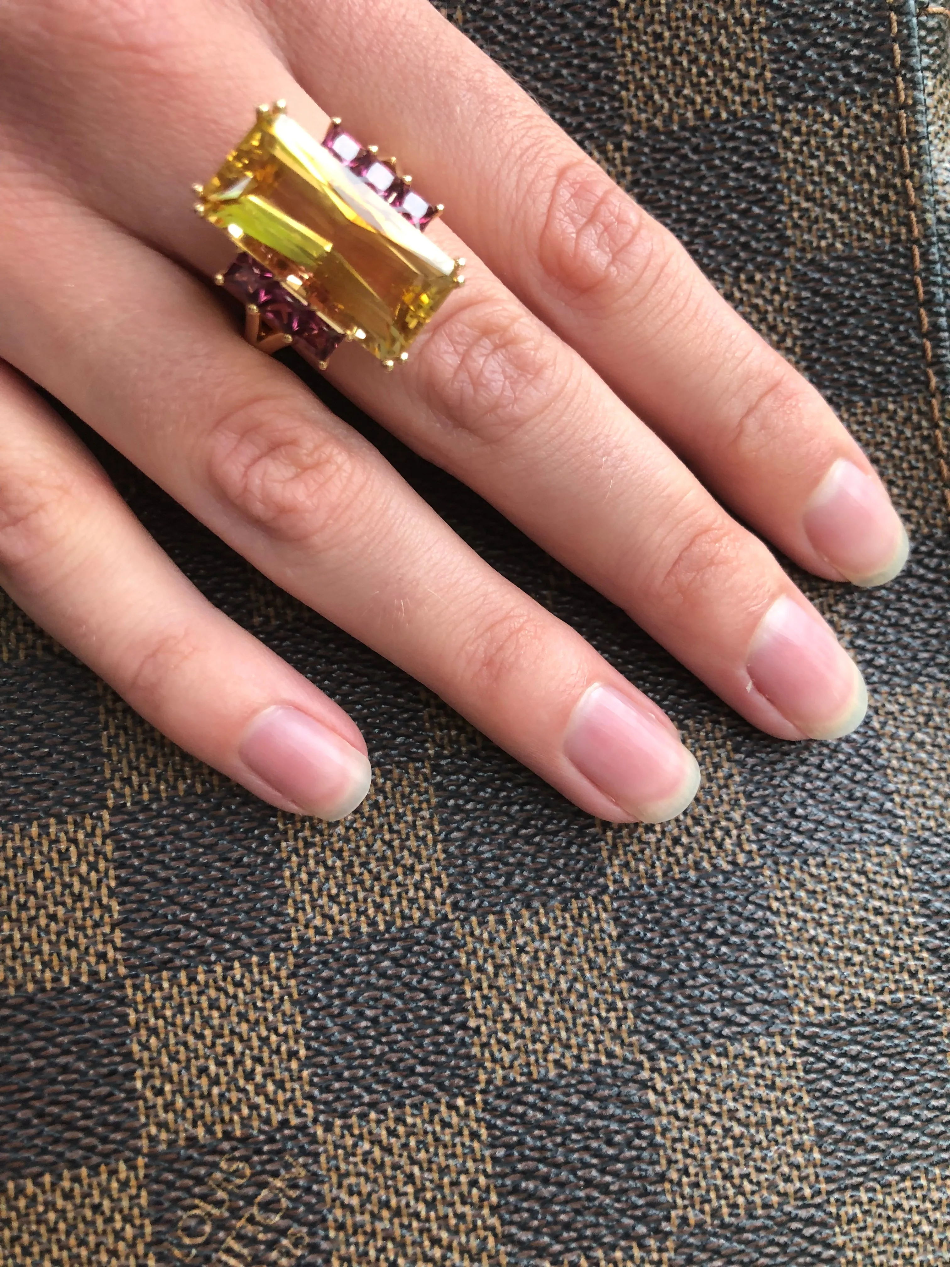 Buchwald 18ct rose gold citrine ring with pink rhodolite side stones
