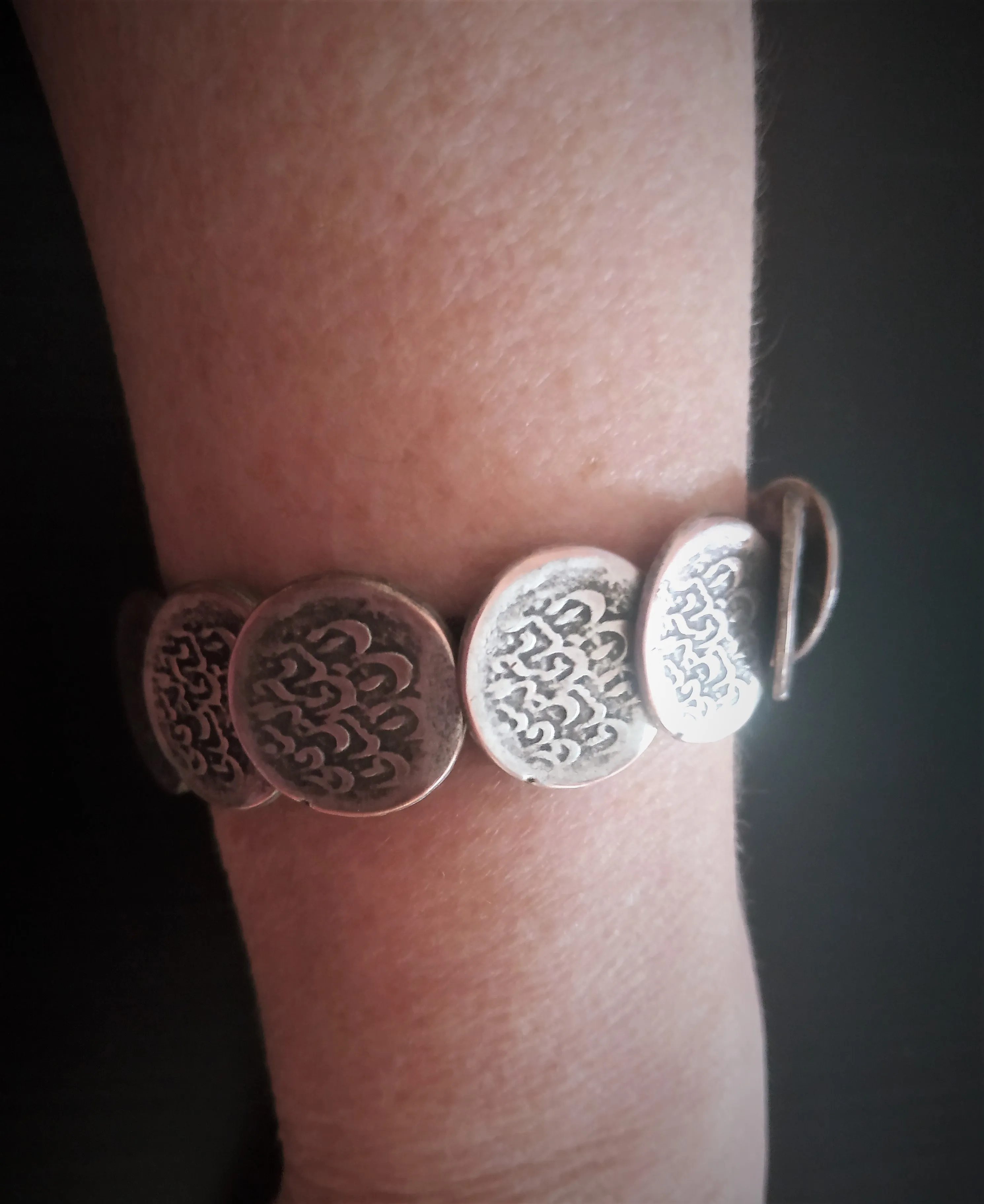 Handmade set of "old coins". Earrings with coral and bracelet