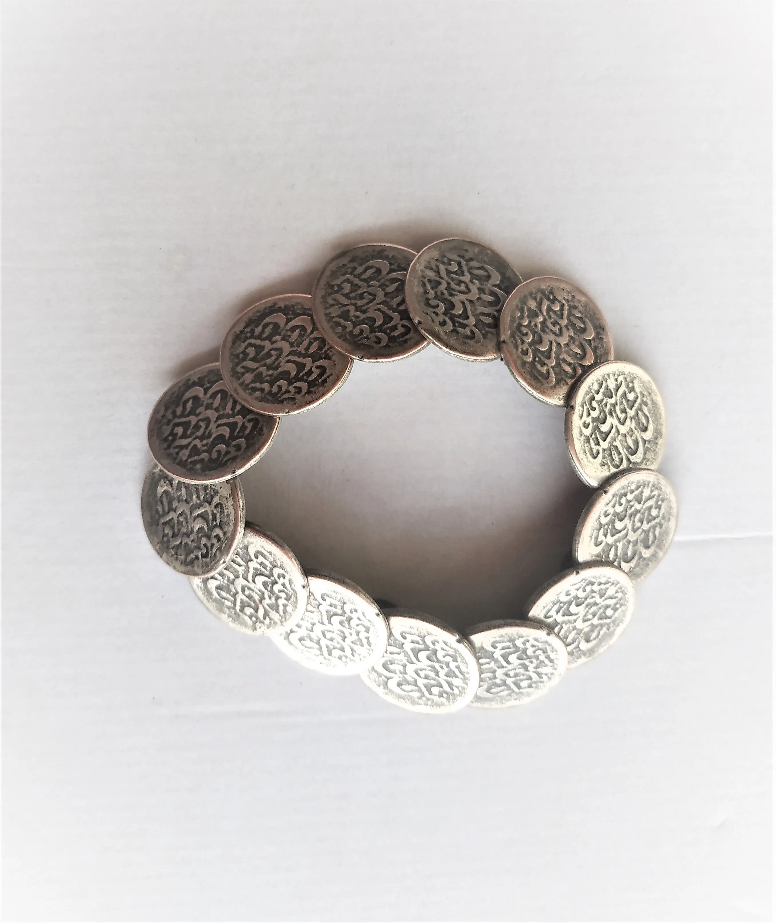 Handmade set of "old coins". Earrings with coral and bracelet
