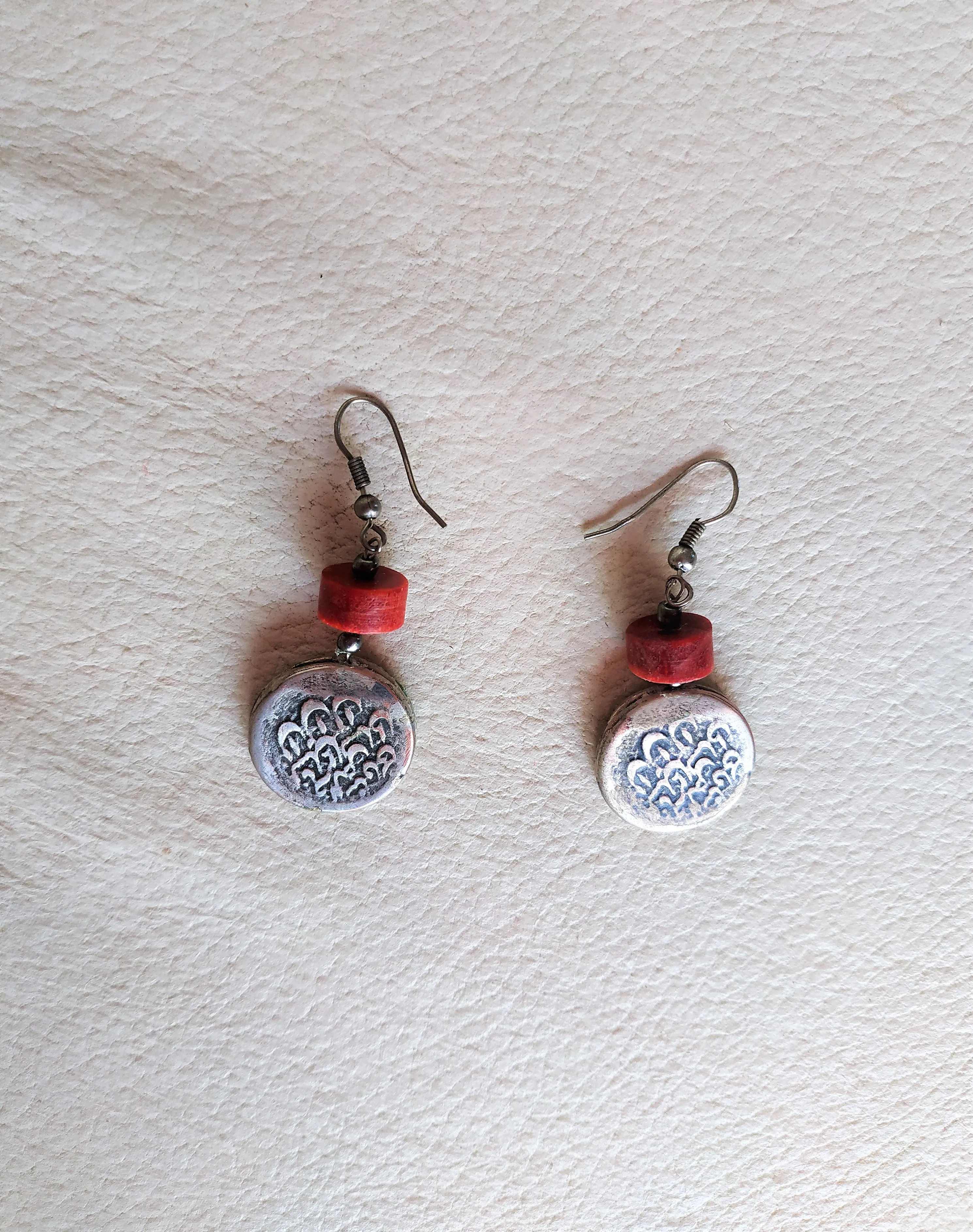 Handmade set of "old coins". Earrings with coral and bracelet