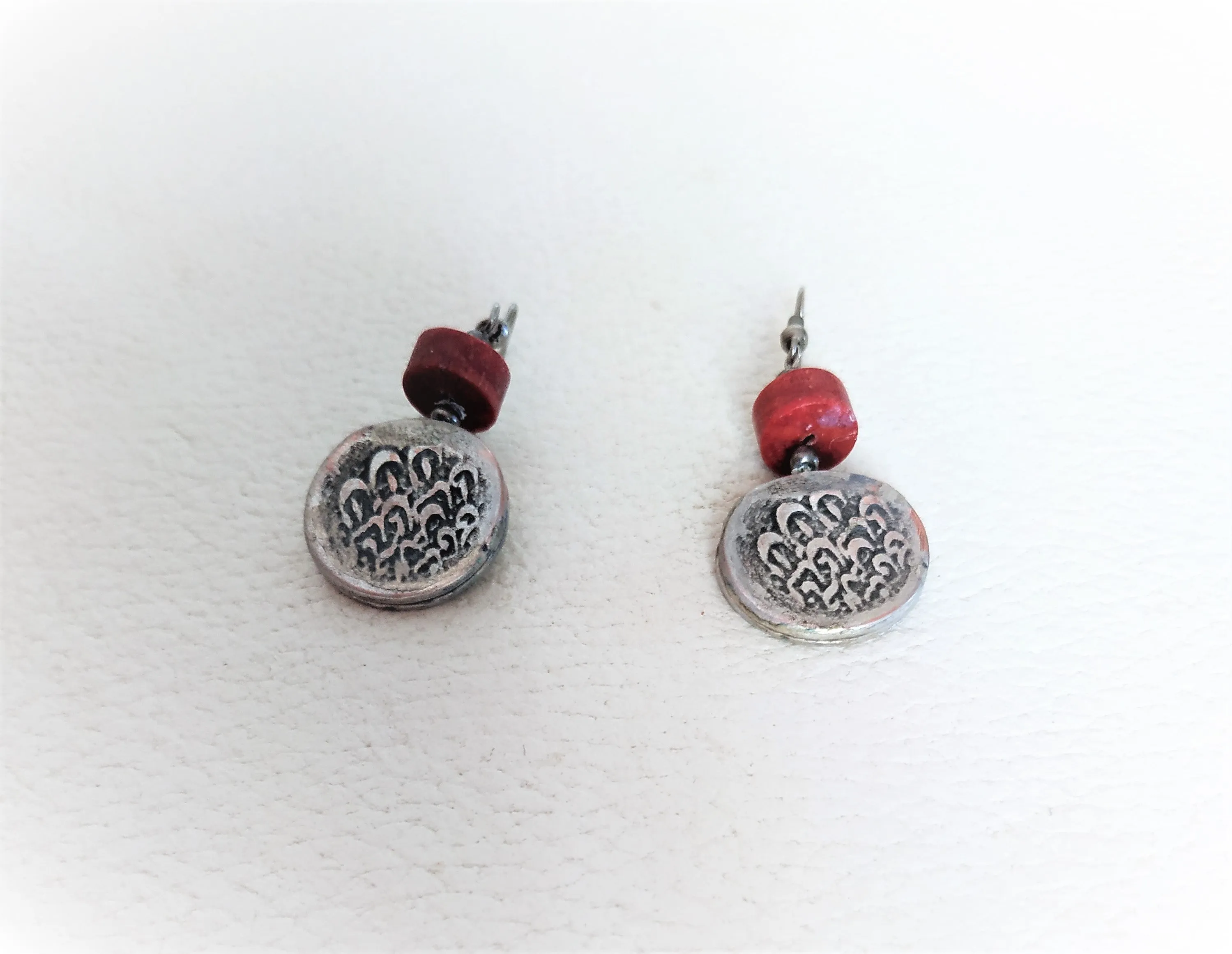 Handmade set of "old coins". Earrings with coral and bracelet