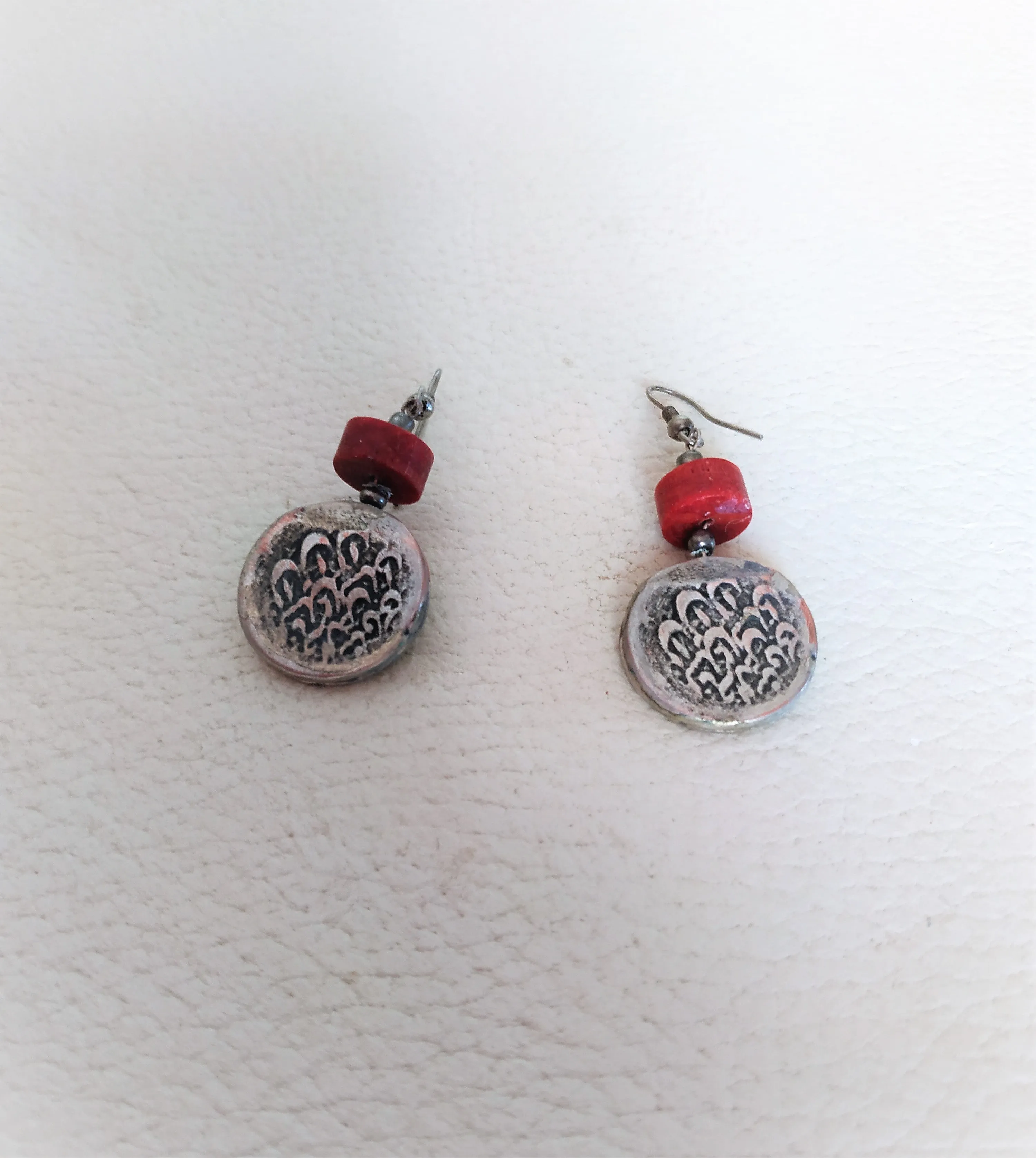 Handmade set of "old coins". Earrings with coral and bracelet