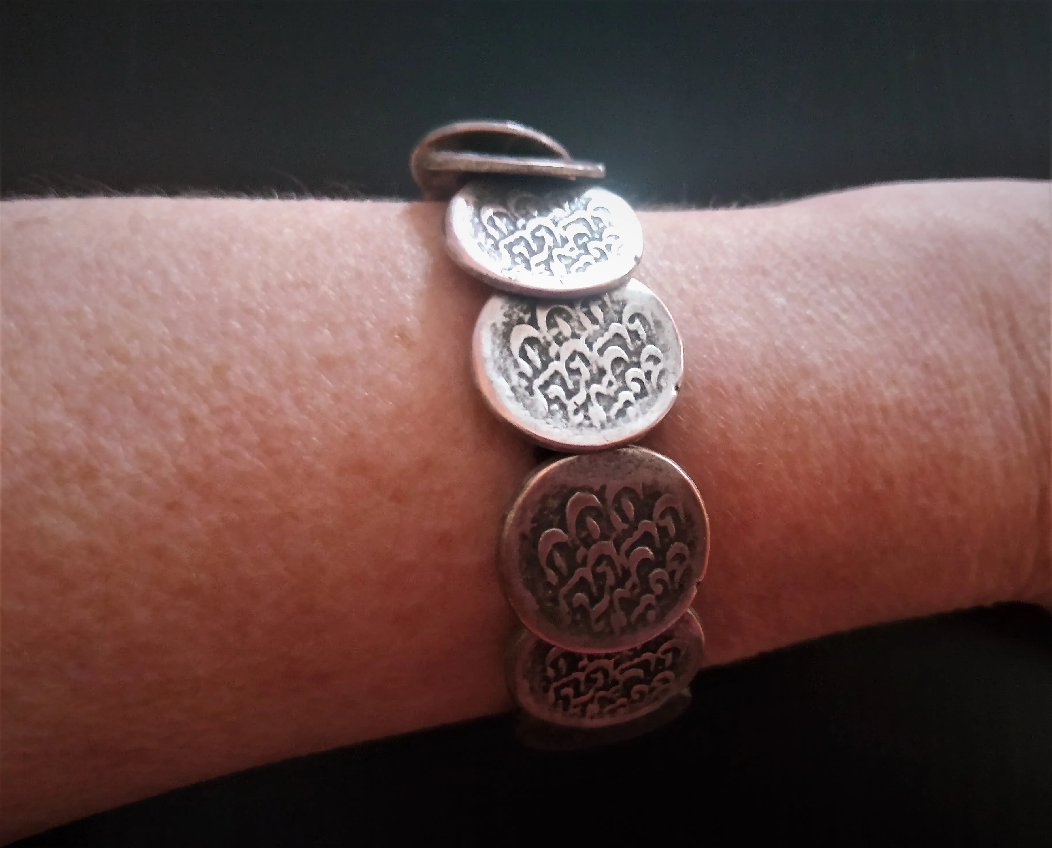Handmade set of "old coins". Earrings with coral and bracelet