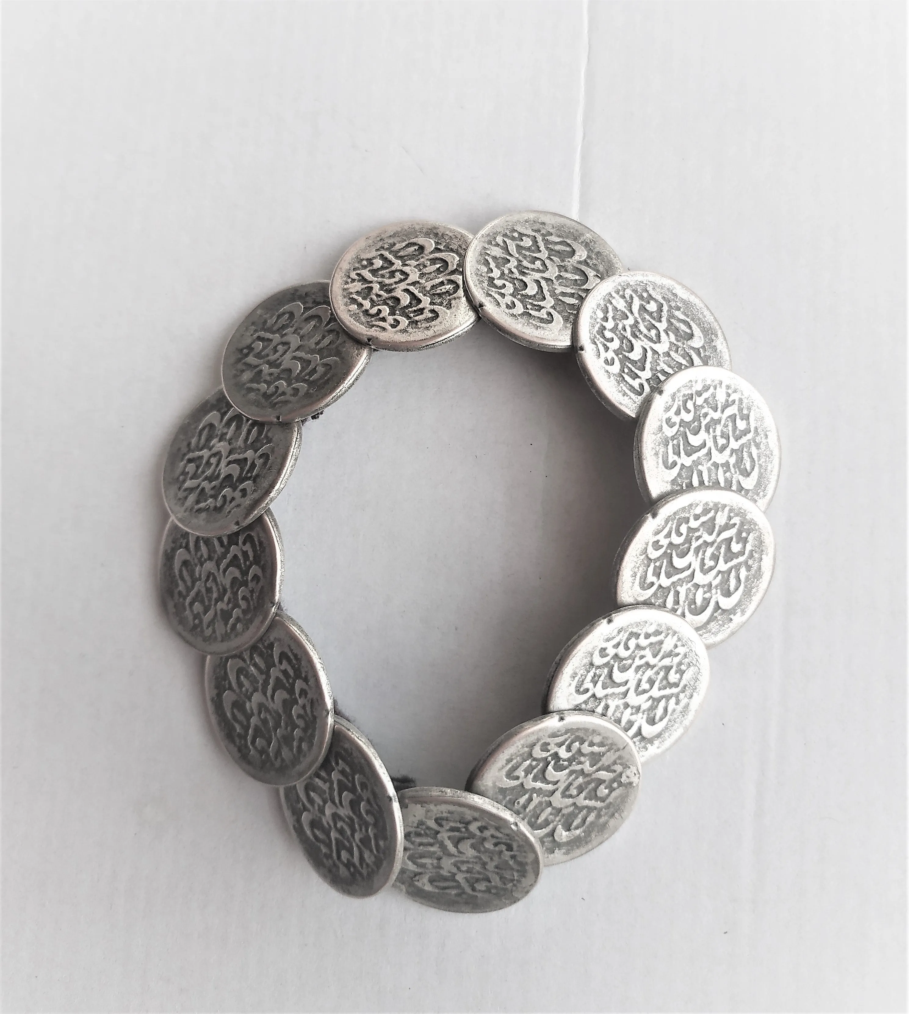 Handmade set of "old coins". Earrings with coral and bracelet