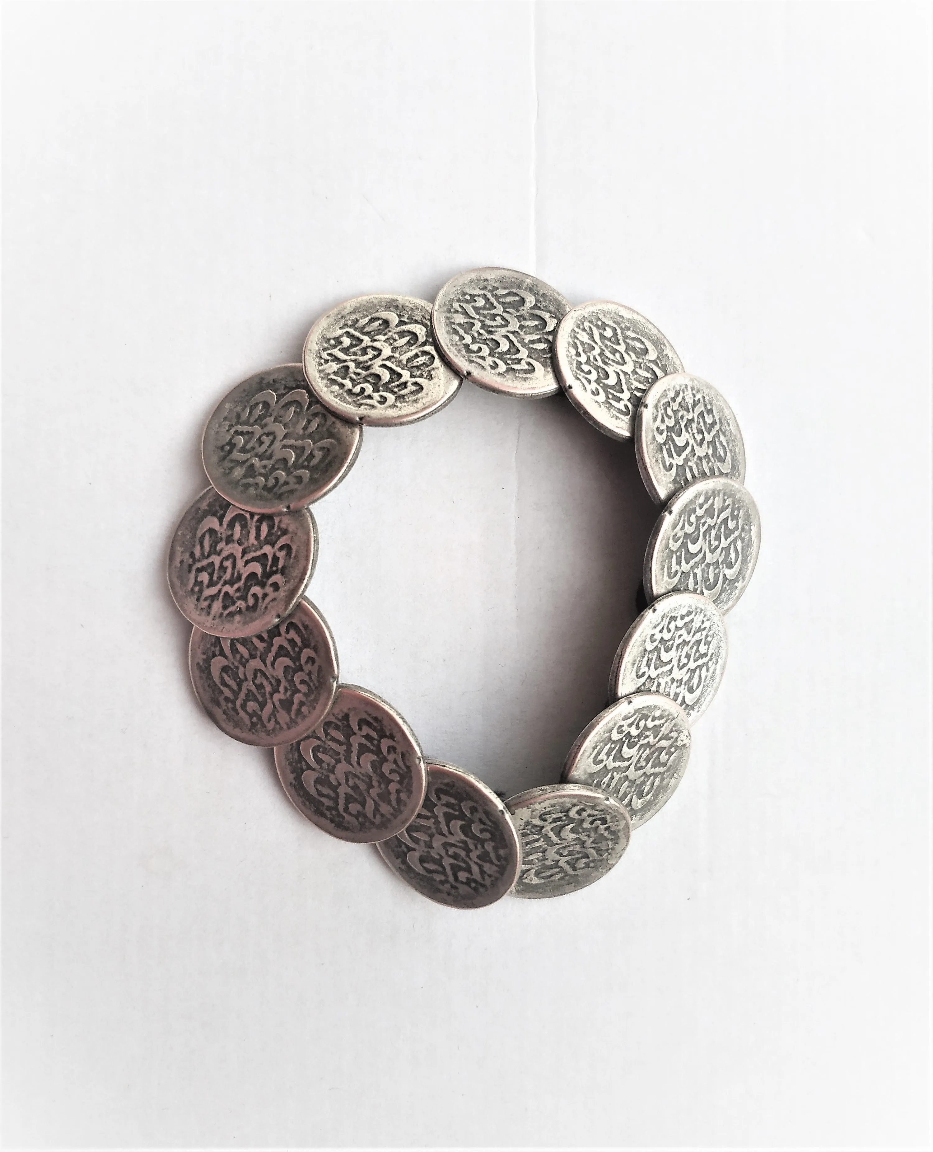 Handmade set of "old coins". Earrings with coral and bracelet