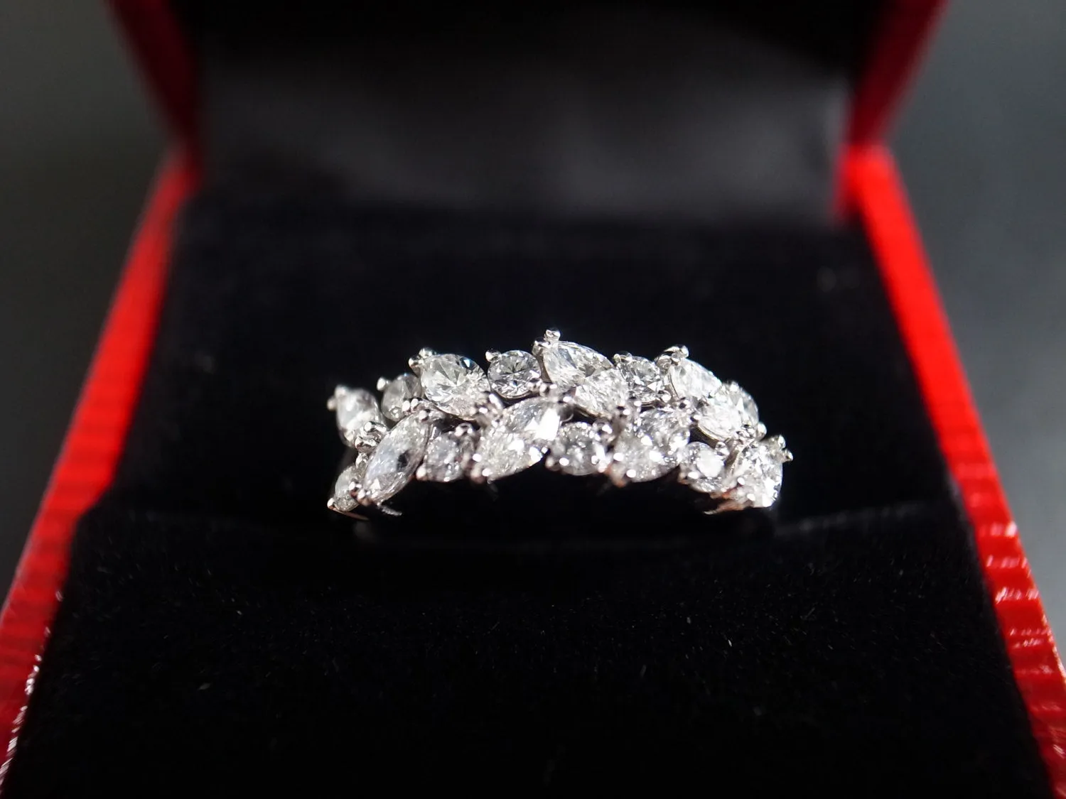Marquise Cut Diamond and Round Brilliant Cut Diamond Ring in White Gold