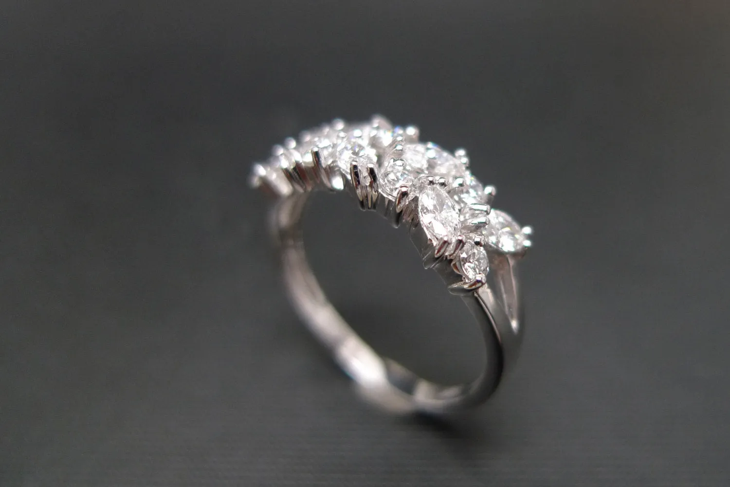 Marquise Cut Diamond and Round Brilliant Cut Diamond Ring in White Gold