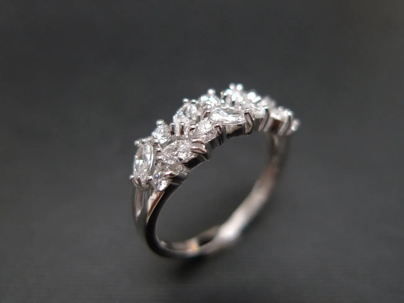 Marquise Cut Diamond and Round Brilliant Cut Diamond Ring in White Gold