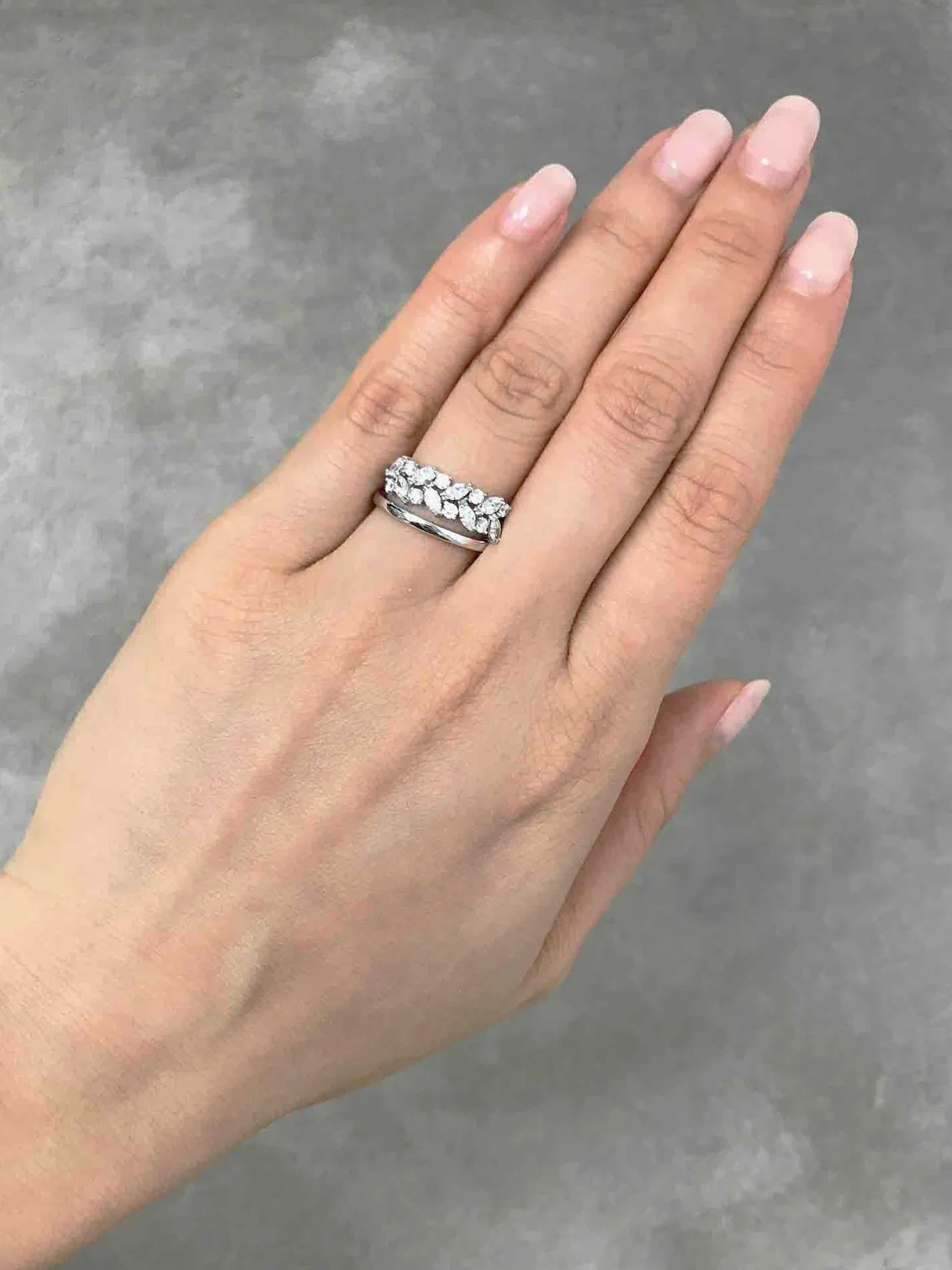Marquise Cut Diamond and Round Brilliant Cut Diamond Ring in White Gold