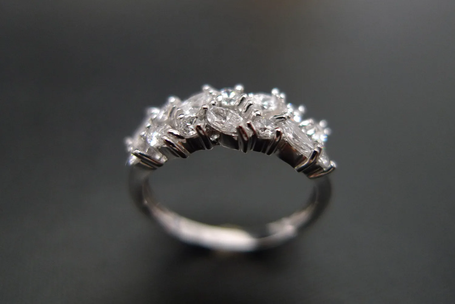 Marquise Cut Diamond and Round Brilliant Cut Diamond Ring in White Gold