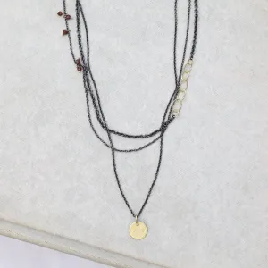 Parchment Disk Triple Chain Necklace with Garnets