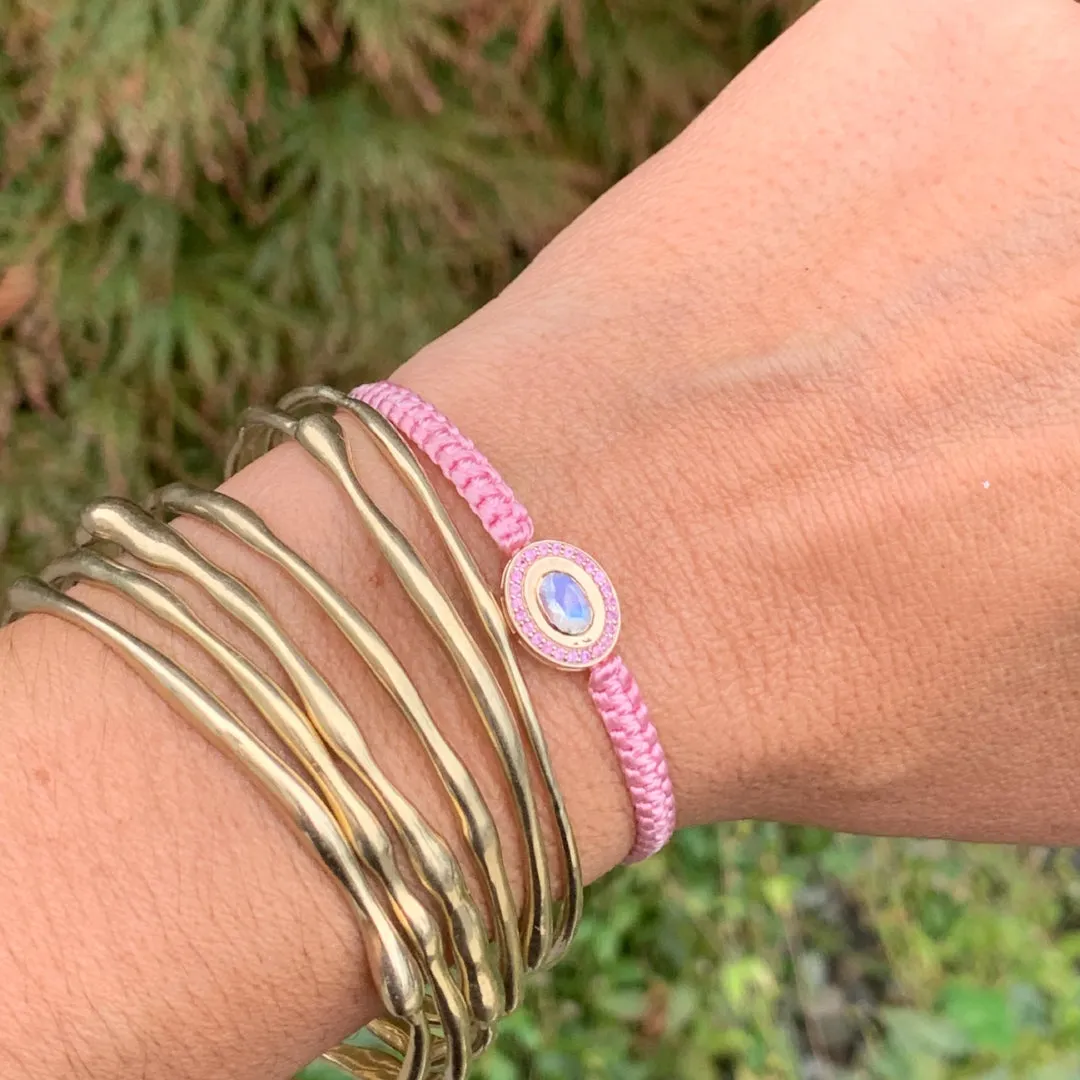 Rainbow Moonstone and Pink Tourmaline braided bracelet in 10k yellow gold.