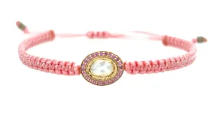 Rainbow Moonstone and Pink Tourmaline braided bracelet in 10k yellow gold.