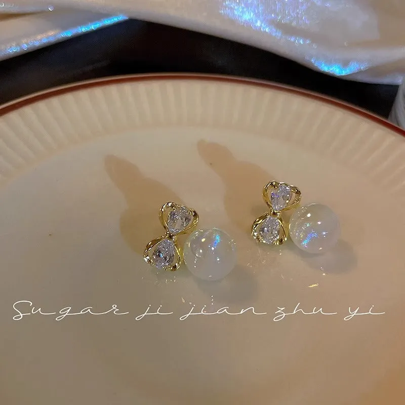Sterling Silver Needle Unique Design Man Yuji Pearl Earrings Light Luxury Zircon
